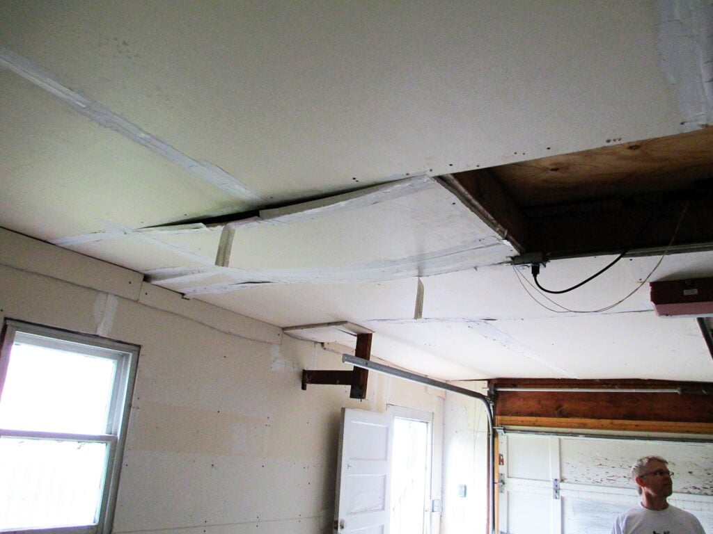 Inspecting inside a home for pest entry points and damage